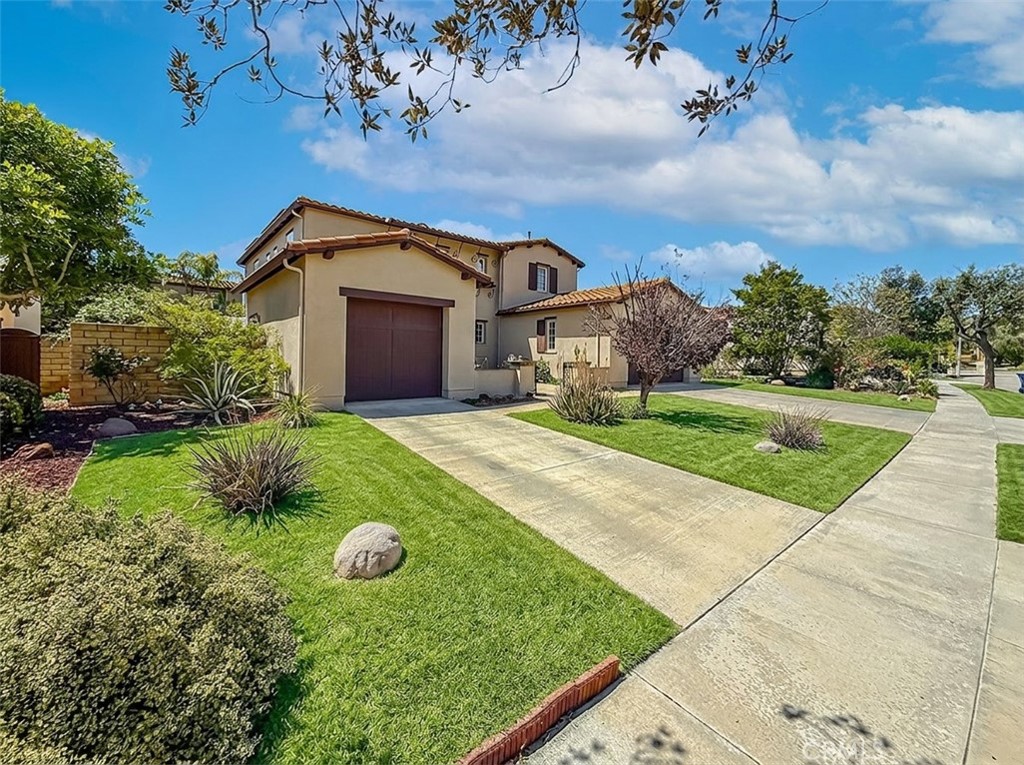 5244 Via Rincon Newbury Park, CA 91320 - Photo 7 of 19 a front view of a house with garden