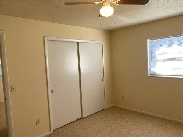 an empty room with window