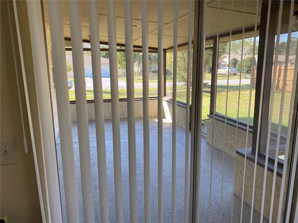 a view of a porch with a door