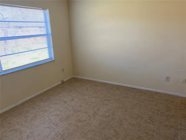 an empty room with a window
