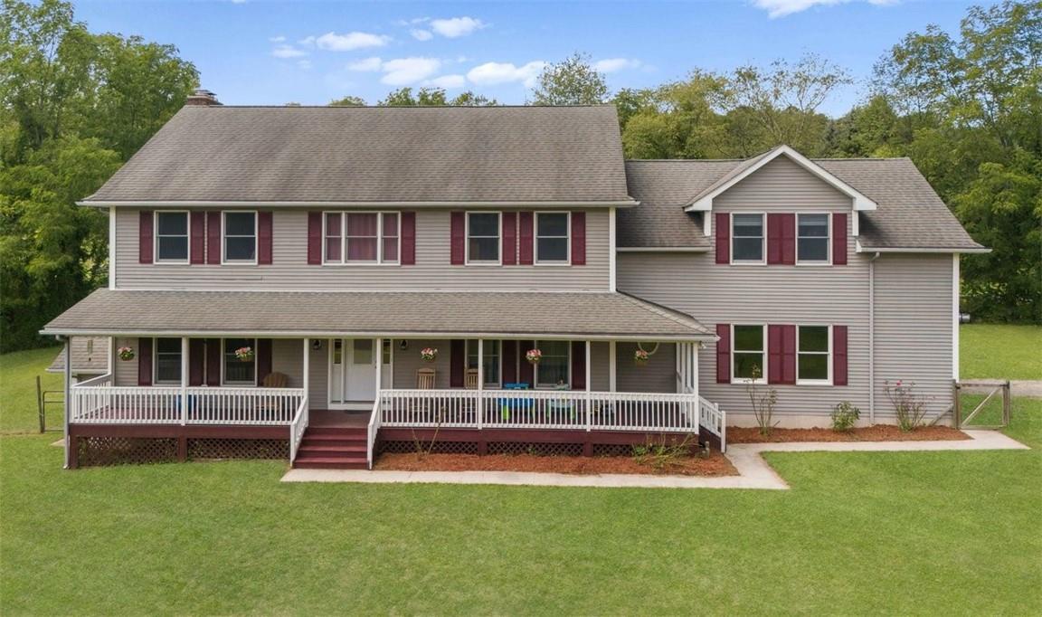 51 Mullock Road Middletown, NY 10940 - Photo 1 of 1 View of the front of home with large rocking chair front porch.