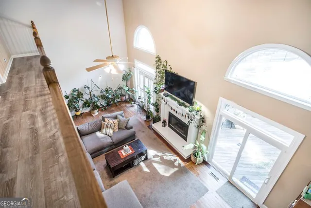 a view of a hallway with stairs
