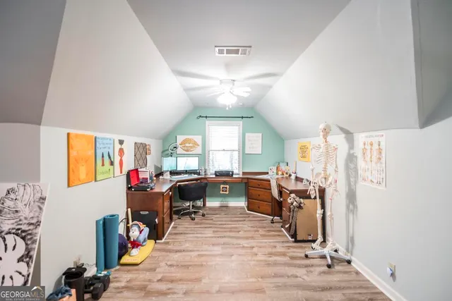 a view of a livingroom with furniture and window