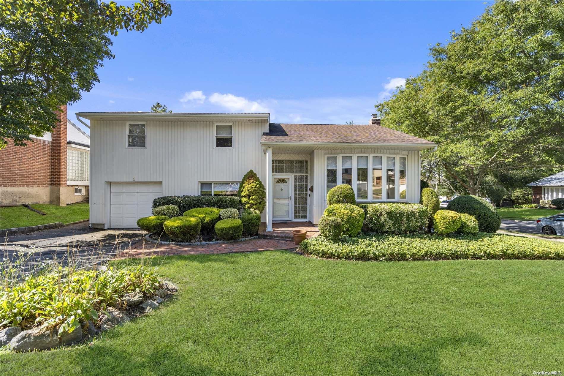 a view of a house with a back yard