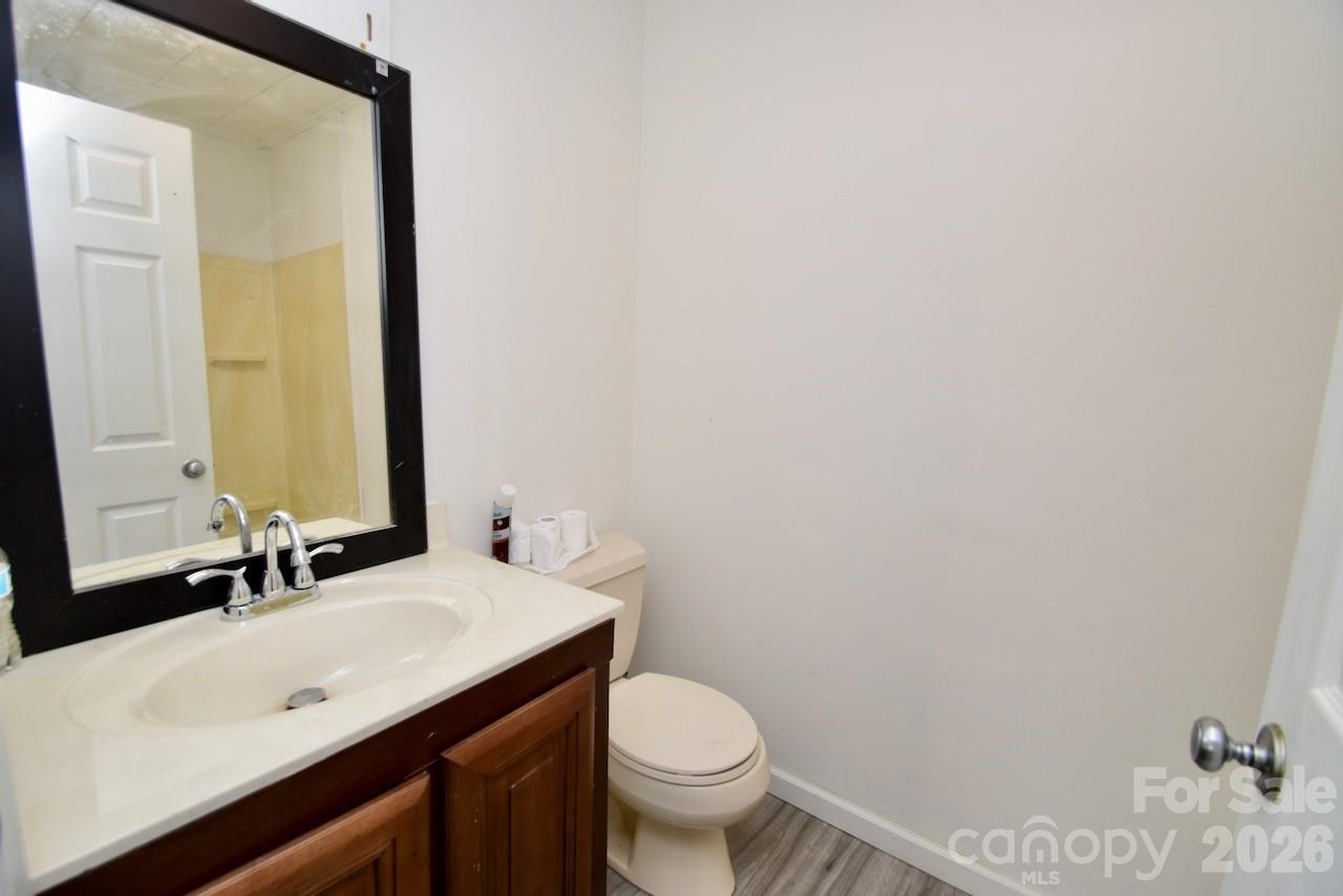 2007 South York Road Gastonia, NC 28052 - Photo 16 of 26 a bathroom with a sink and a toilet