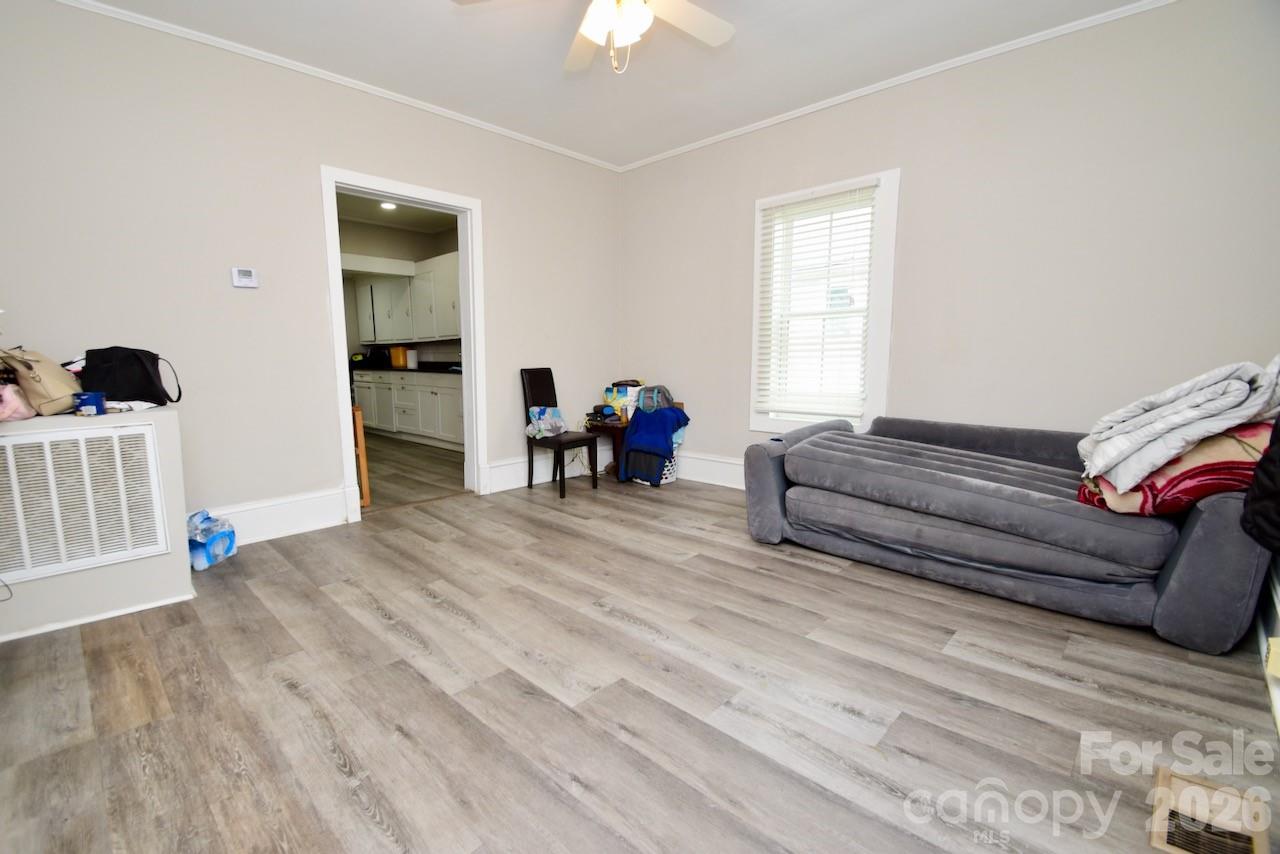 2007 South York Road Gastonia, NC 28052 - Photo 2 of 26 a living room with furniture and a window