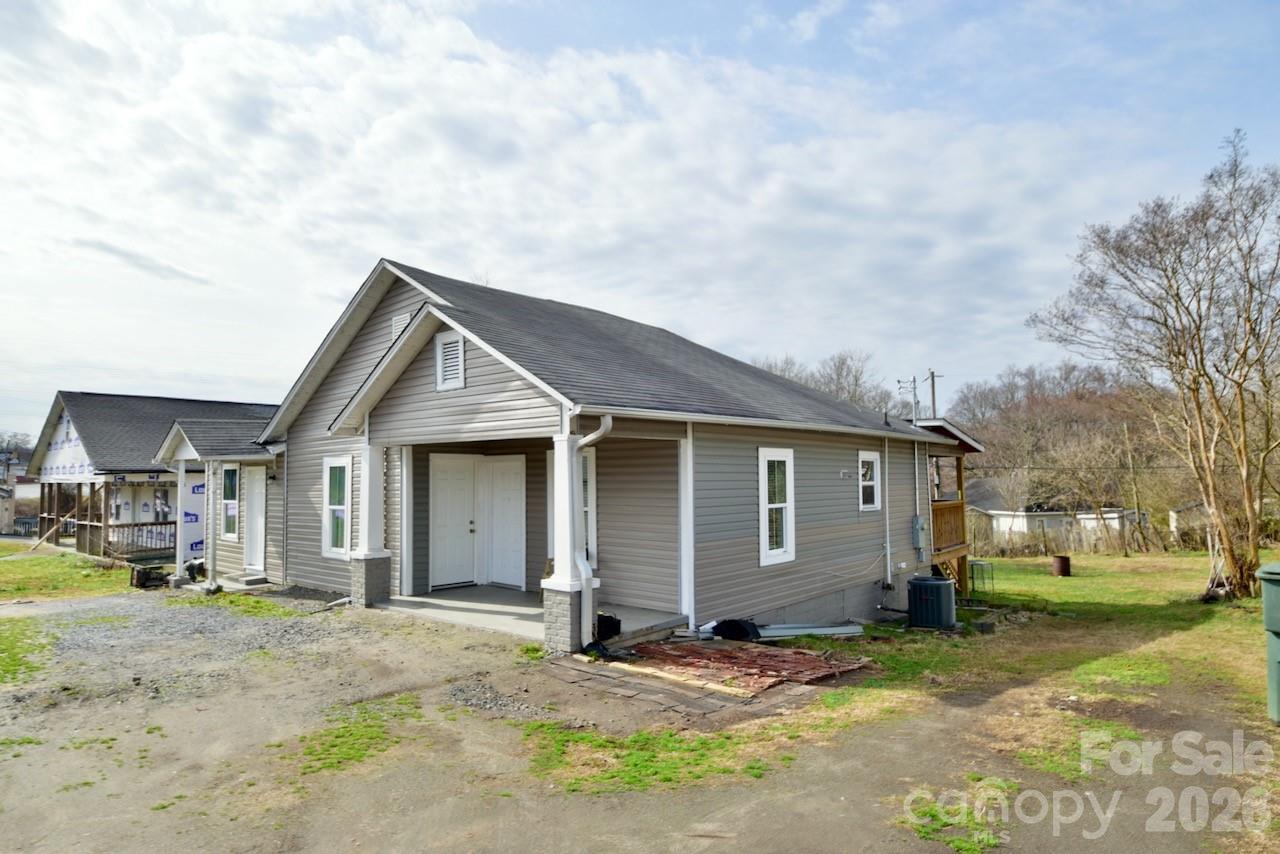 2007 South York Road Gastonia, NC 28052 - Photo 21 of 26 a view of a house with a yard