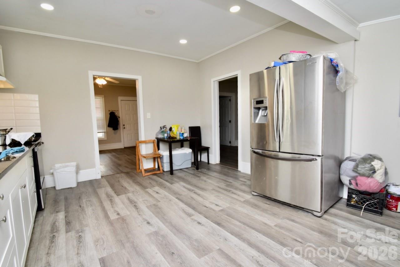 2007 South York Road Gastonia, NC 28052 - Photo 6 of 26 a kitchen with stainless steel appliances a refrigerator and wooden floor
