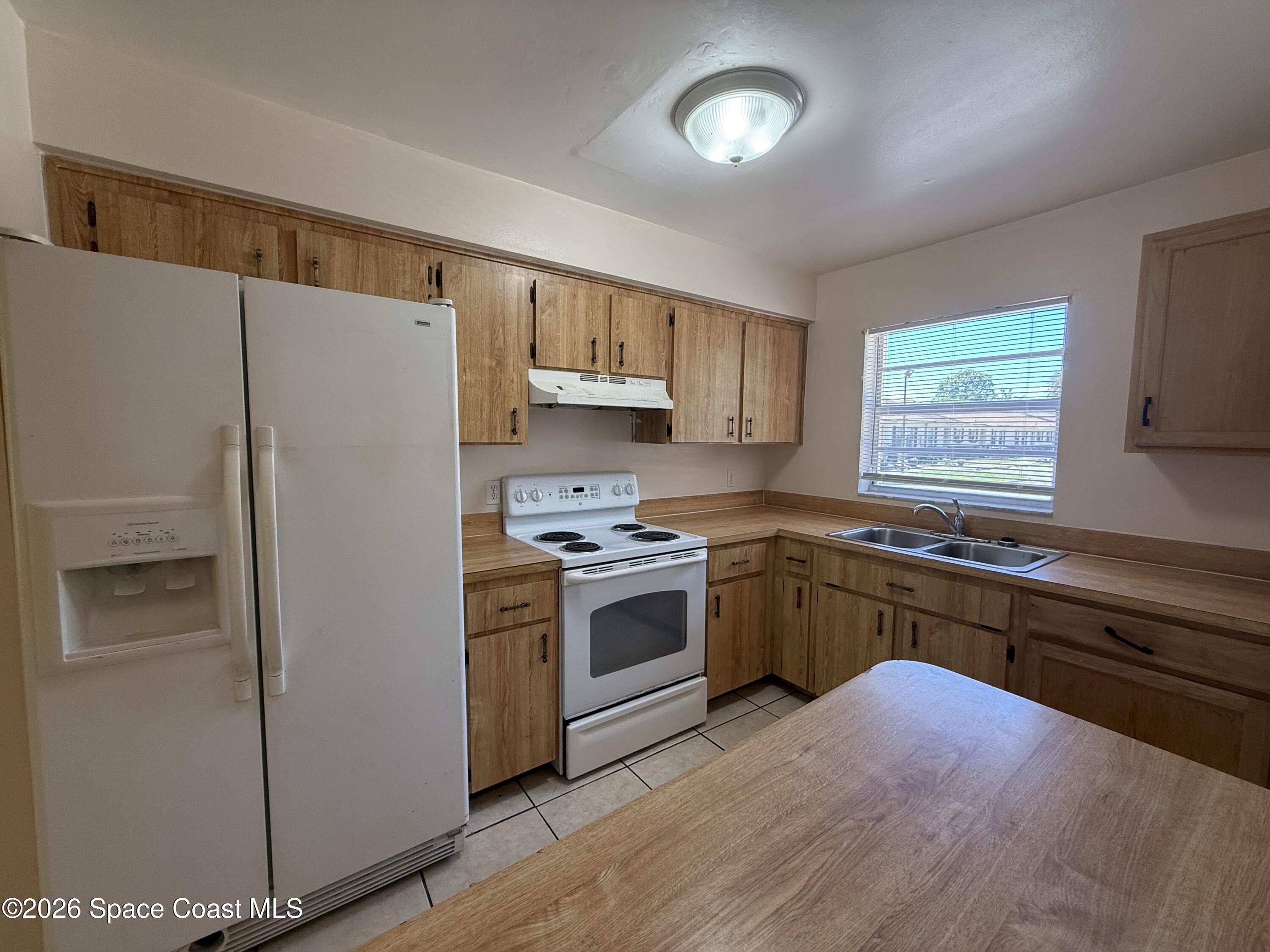 1514 Clearlake Road, Unit 110 Cocoa, FL 32922 - Photo 2 of 23 IMG_2206