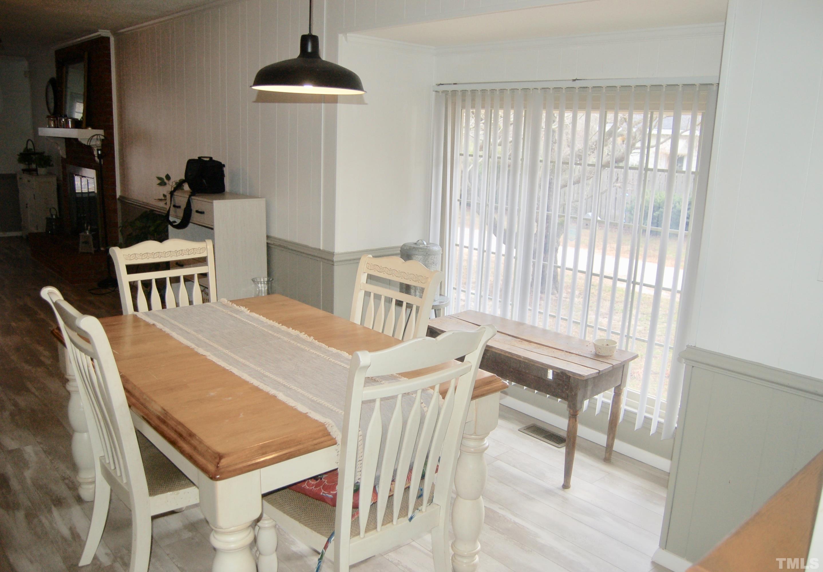 1096 Core Road Dunn, NC 28334 - Photo 4 of 15 a dining room with furniture and wooden floor