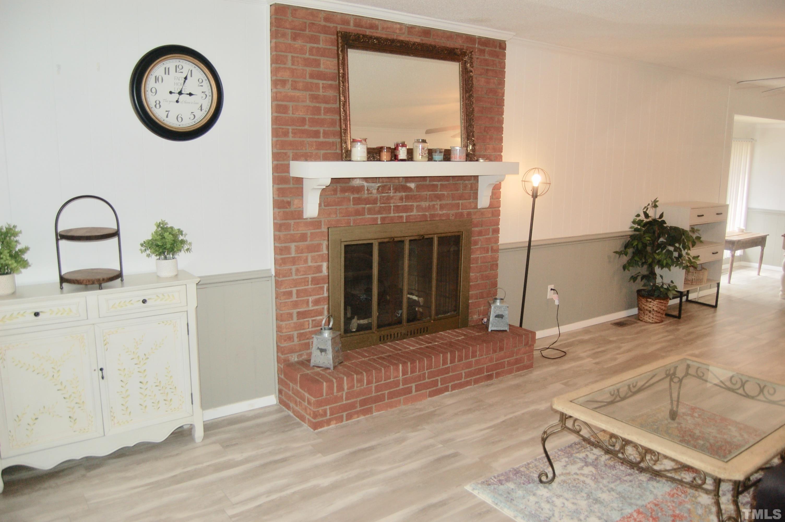 1096 Core Road Dunn, NC 28334 - Photo 6 of 15 a living room with furniture and a fireplace