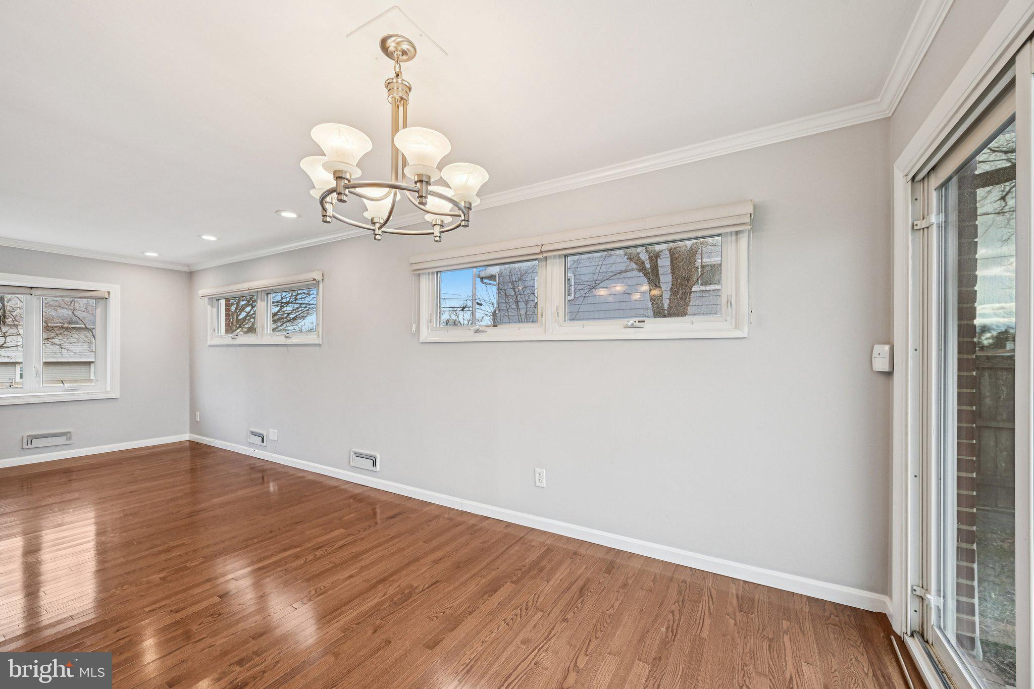 6003 Johnnycake Road Catonsville, MD 21228 - Photo 13 of 49 Dining room with gleaming hardwood floors
