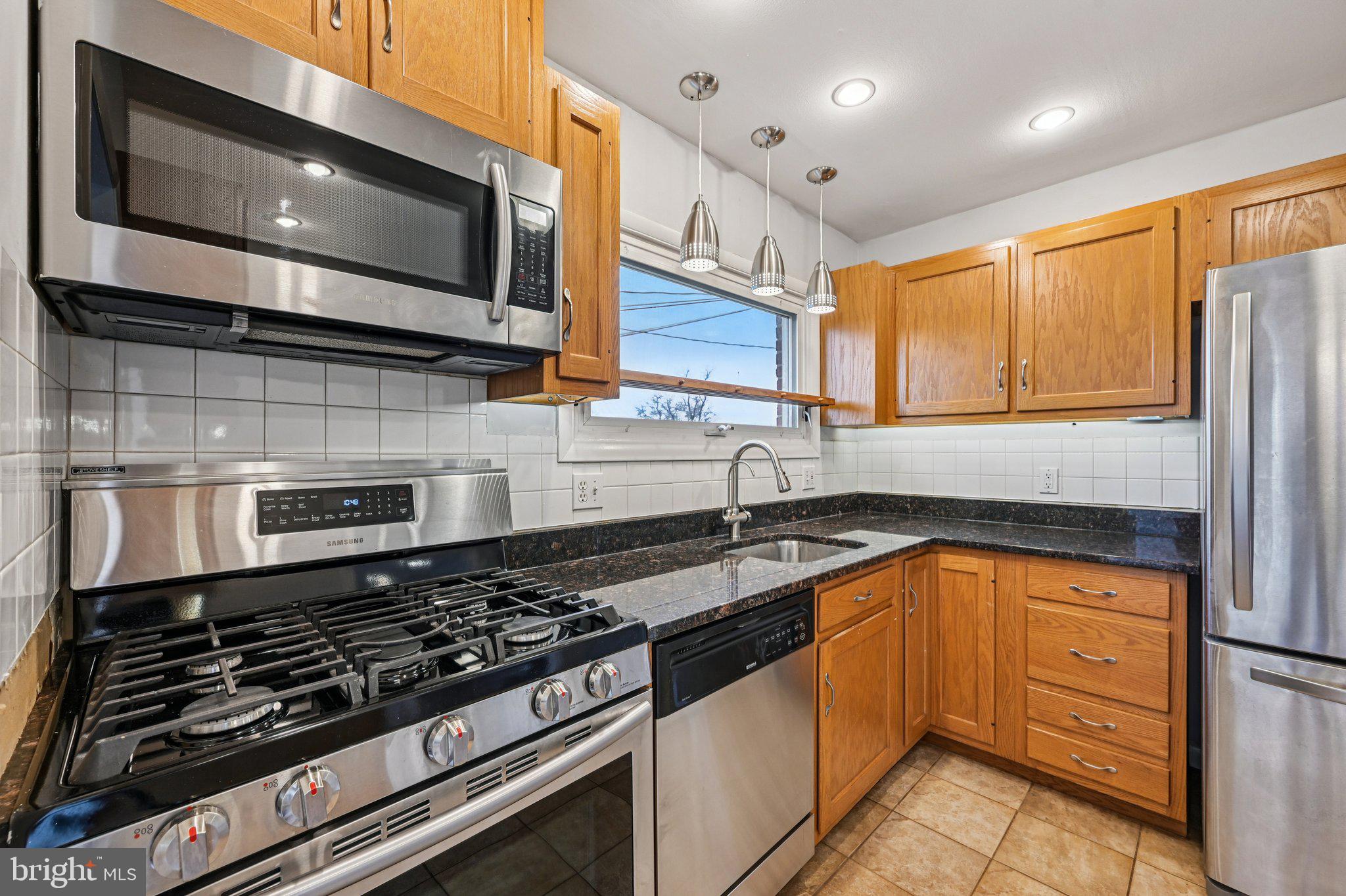 6003 Johnnycake Road Catonsville, MD 21228 - Photo 18 of 49 Stainless steel appliances, lovely kitchen window
