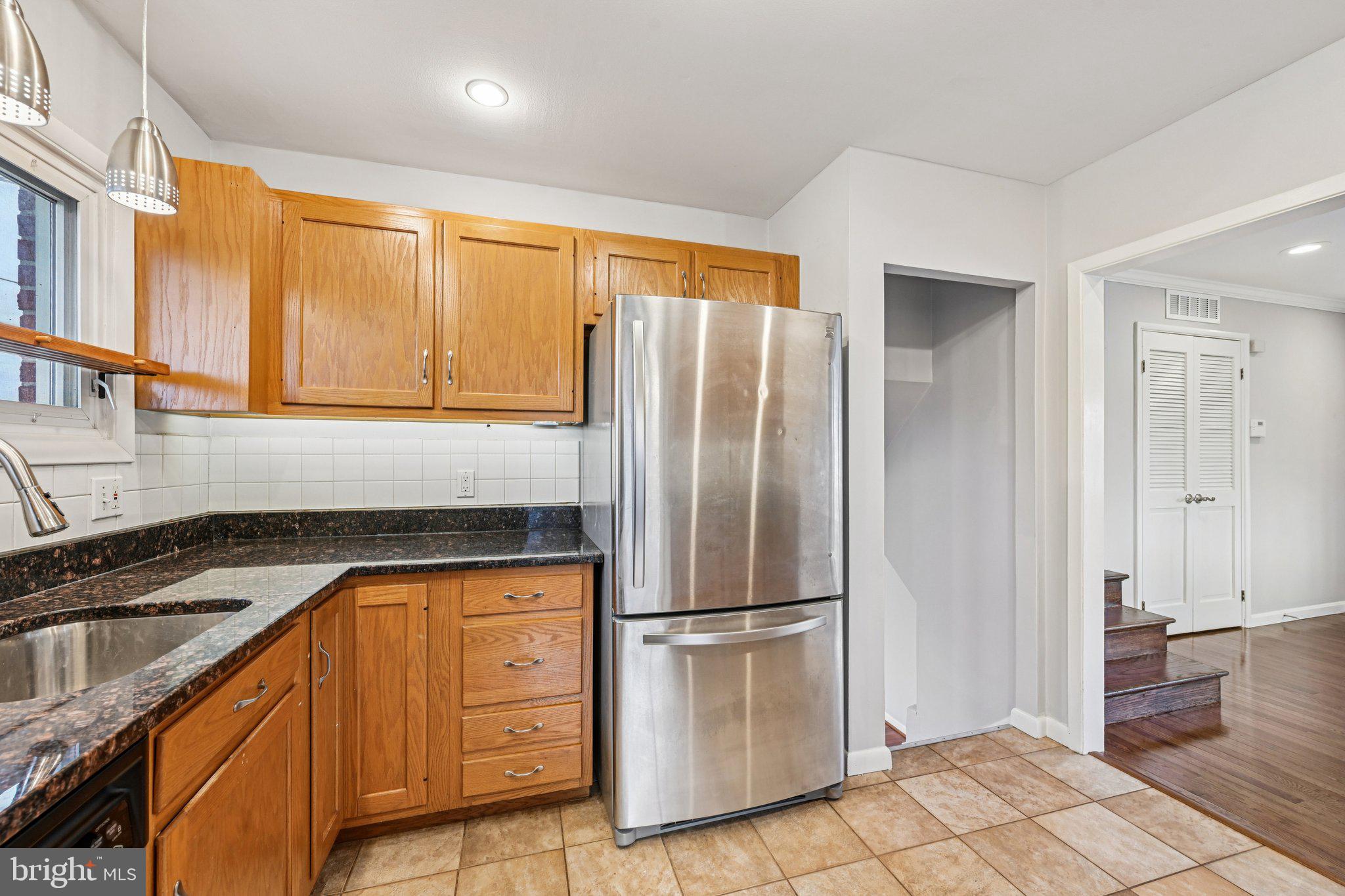6003 Johnnycake Road Catonsville, MD 21228 - Photo 19 of 59 Granite countertops, and tile floors