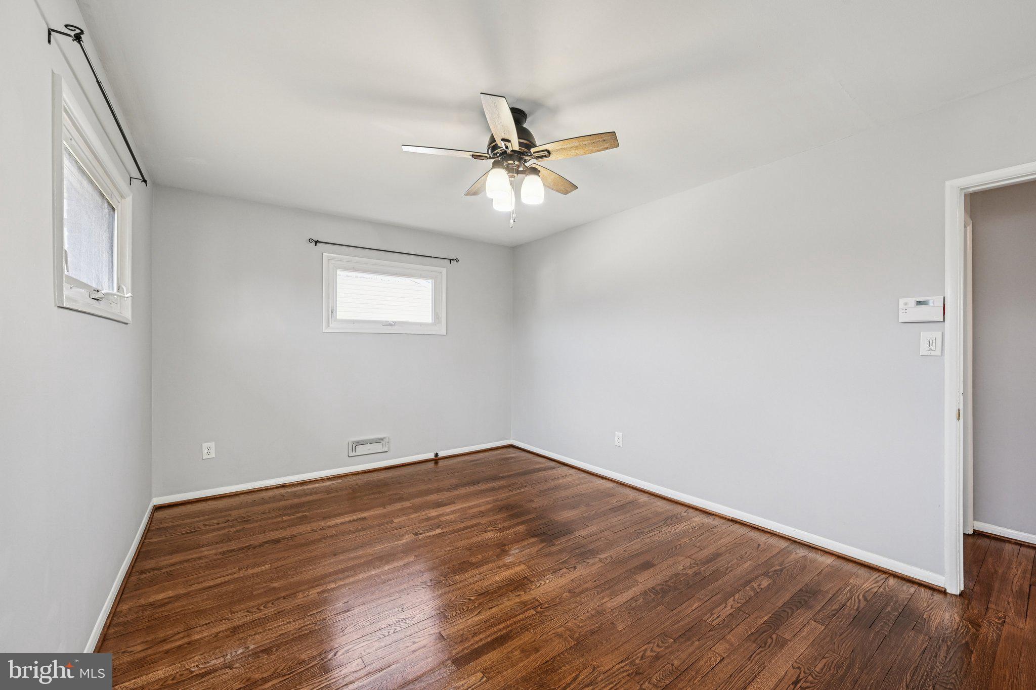 6003 Johnnycake Road Catonsville, MD 21228 - Photo 20 of 49 Primary bedroom, hardwood floors, ceiling fan