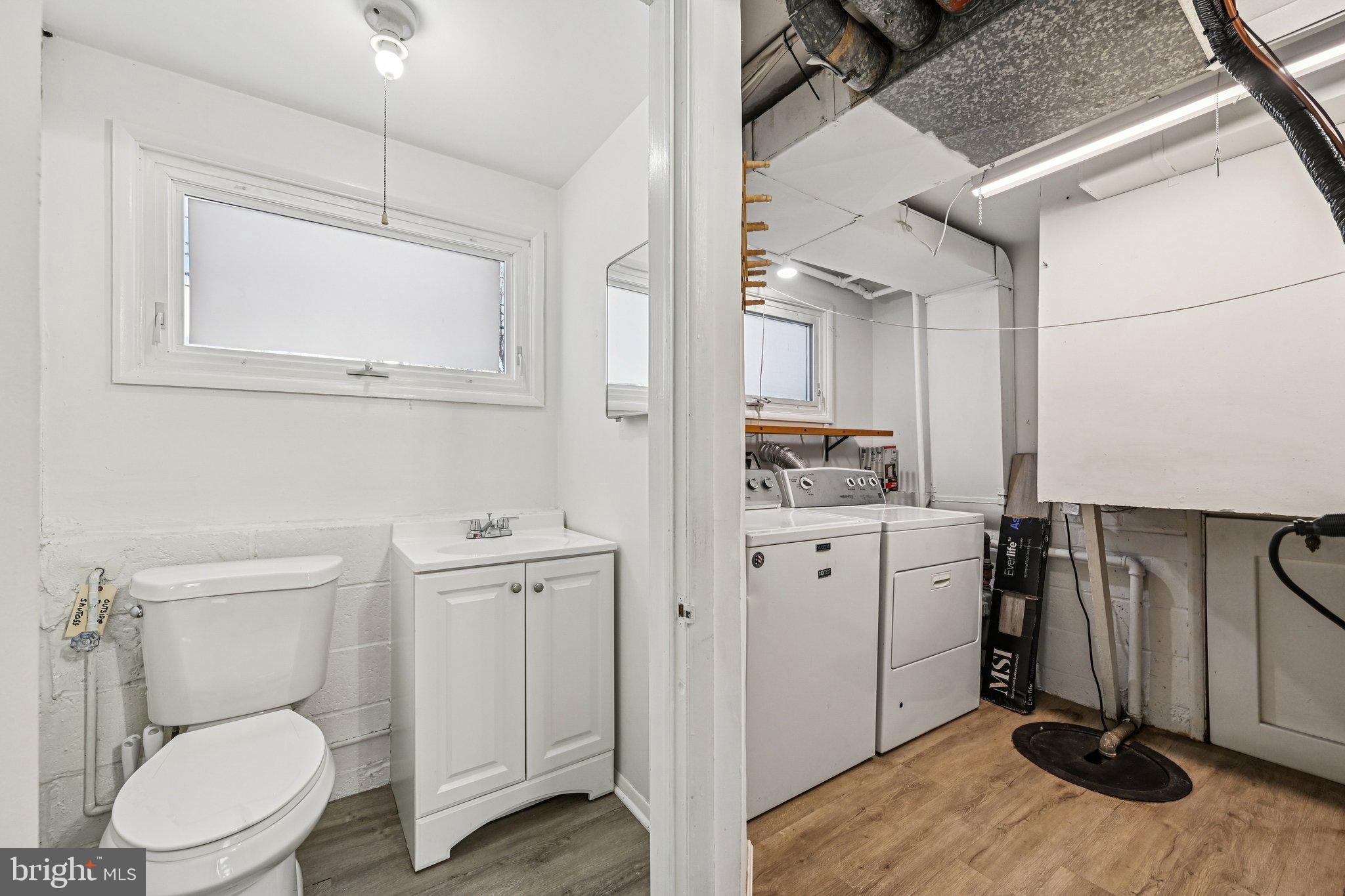 6003 Johnnycake Road Catonsville, MD 21228 - Photo 45 of 59 Bright half bathroom lower level, utility room