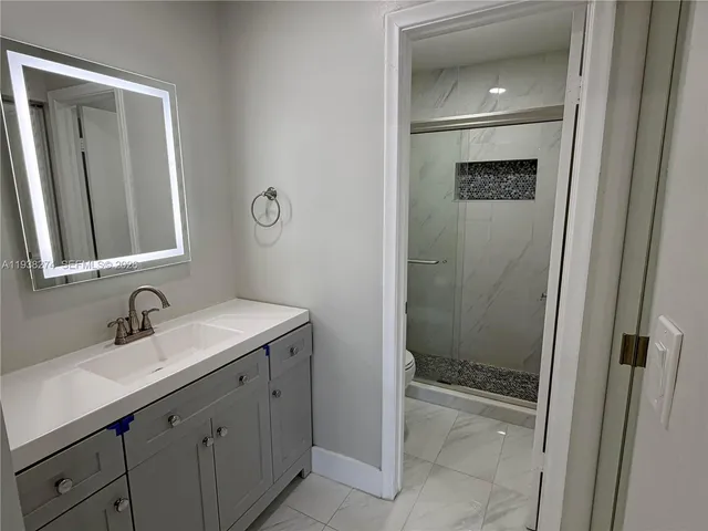 a view of an entryway with a front door