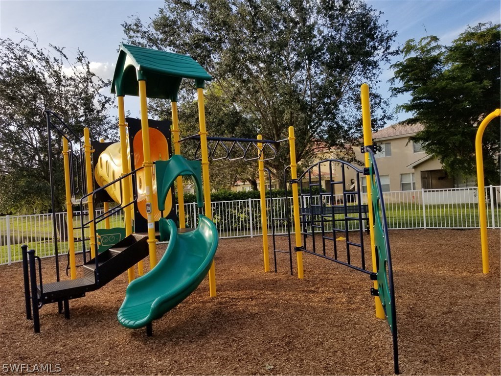 9341 Chestnut Tree Loop Fort Myers, FL 33967 - Photo 19 of 31 a view of a park with slide