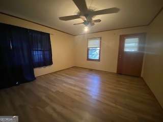 225 Old 29 Highway Hartwell, GA 30643 - Photo 13 of 14 a view of an empty room with a window and wooden floor