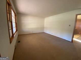 225 Old 29 Highway Hartwell, GA 30643 - Photo 7 of 14 an empty room with windows