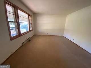 225 Old 29 Highway Hartwell, GA 30643 - Photo 8 of 14 an empty room with a window