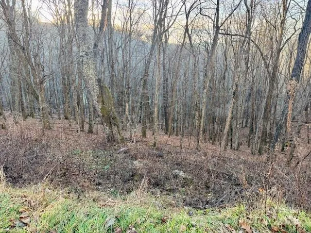 a view of a building with sitting area