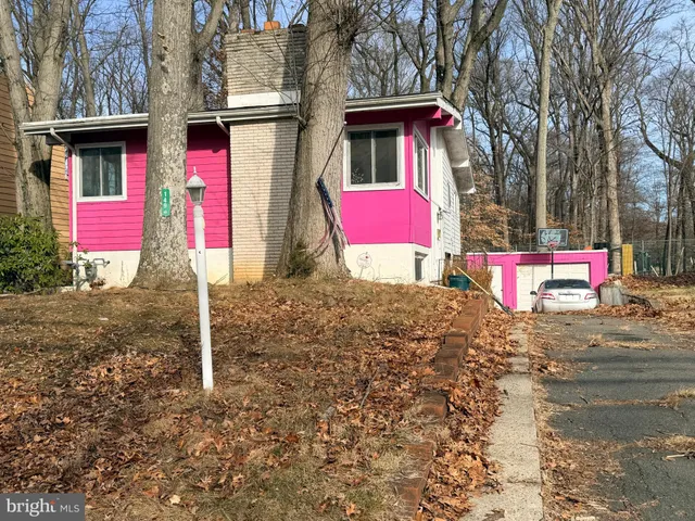 a front view of a house with yard