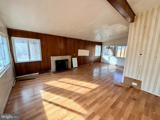 a view of a livingroom with a furniture and window
