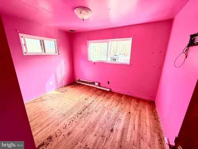 a bathroom with a toilet and a sink