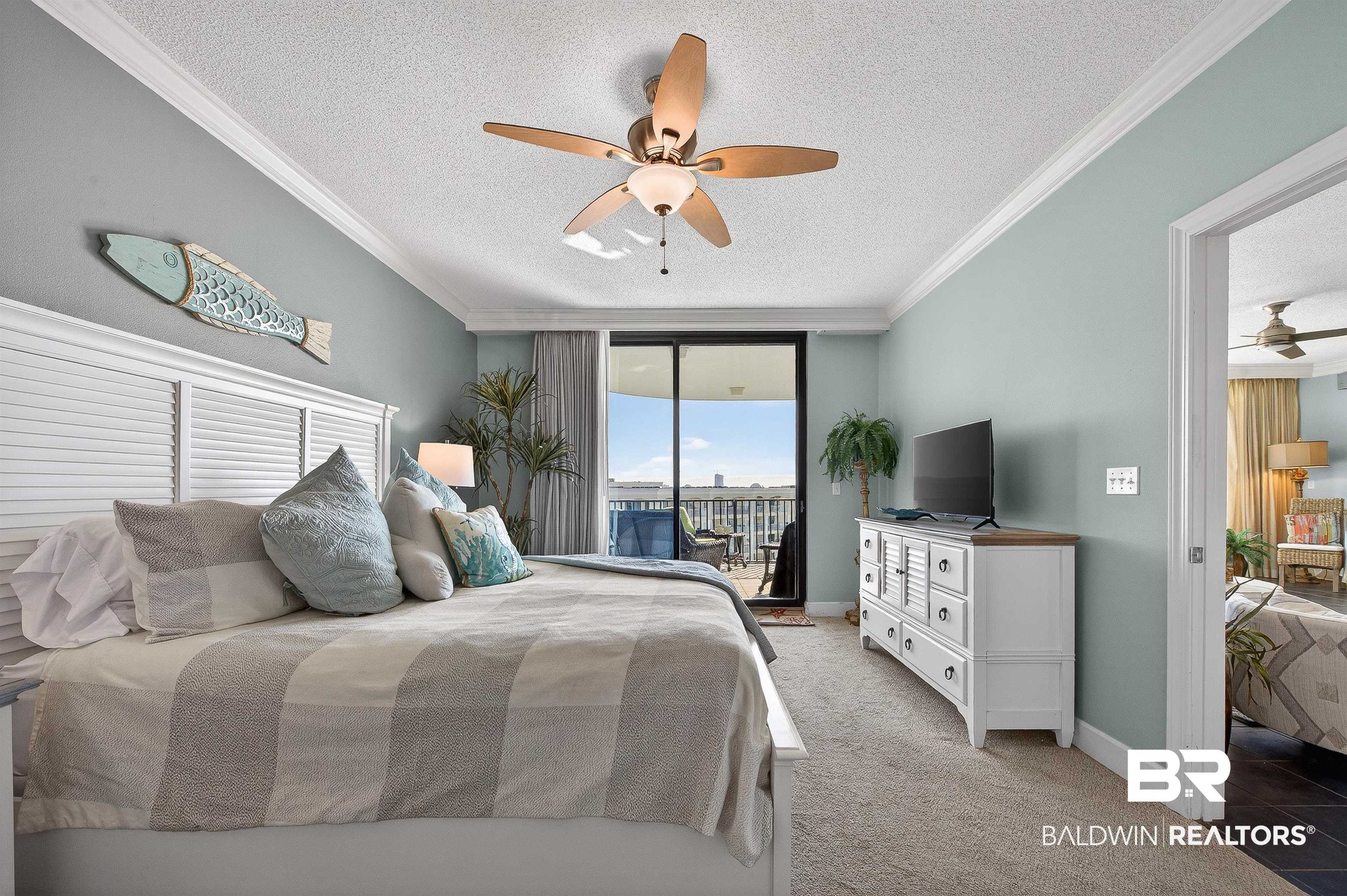 27582 Canal Road, Unit 2507 Orange Beach, AL 36561 - Photo 28 of 75 Carpeted bedroom featuring access to exterior, a textured ceiling, crown molding, ceiling fan, and floor to ceiling windows