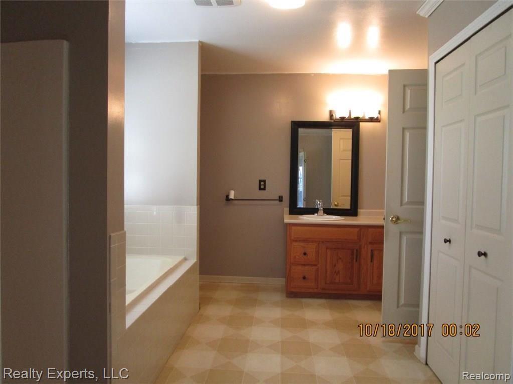 3851 Canton Ctr Road Canton, MI 48188 - Photo 9 of 18 main floor bathroom.jpg