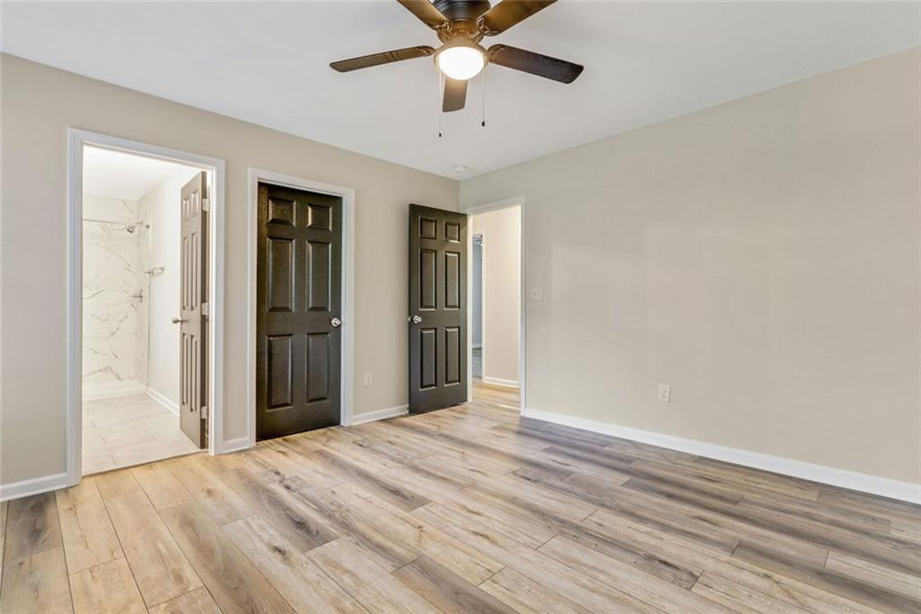 129 Pierce Hill Road Northeast Rome, GA 30161 - Photo 13 of 25 a view of a livingroom with a chandelier fan