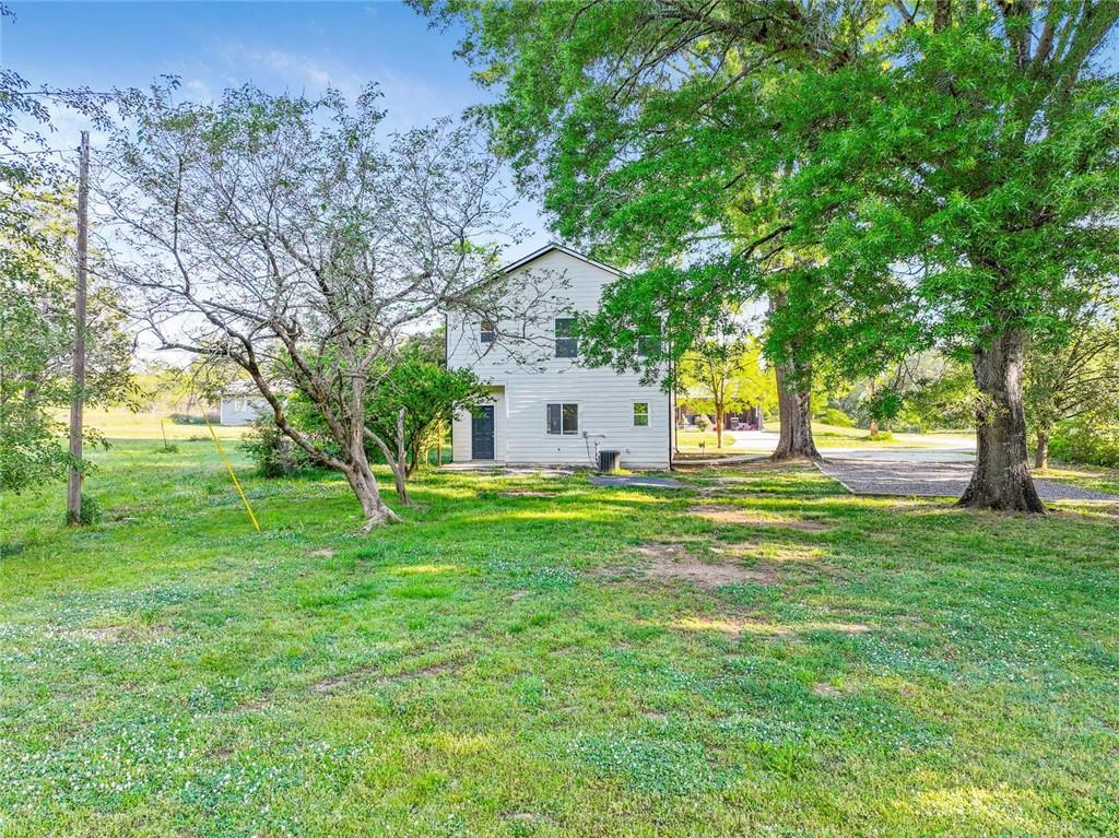 129 Pierce Hill Road Northeast Rome, GA 30161 - Photo 23 of 25 a view of a house with a big yard