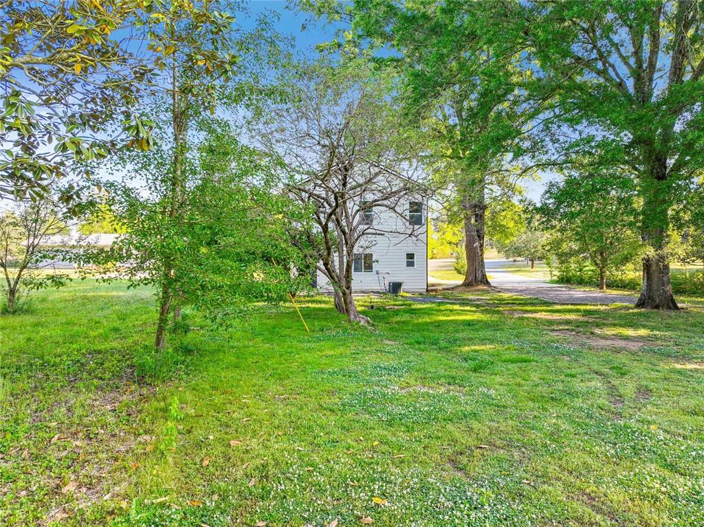 129 Pierce Hill Road Northeast Rome, GA 30161 - Photo 24 of 25 a view of a tree in front of a house