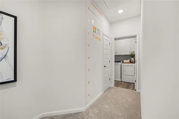 a bedroom with a bed and dresser