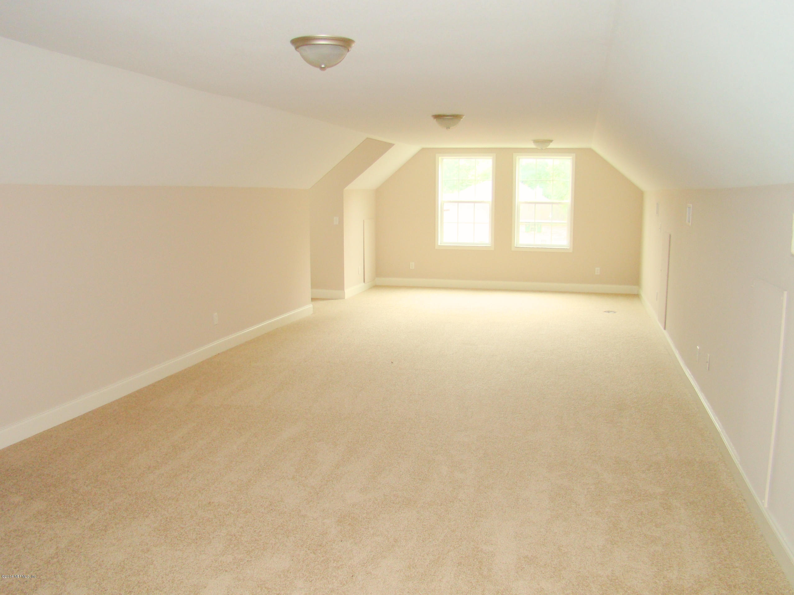 1716 Mccaul Road Jacksonville, FL 32220 - Photo 13 of 25 an empty room with a window