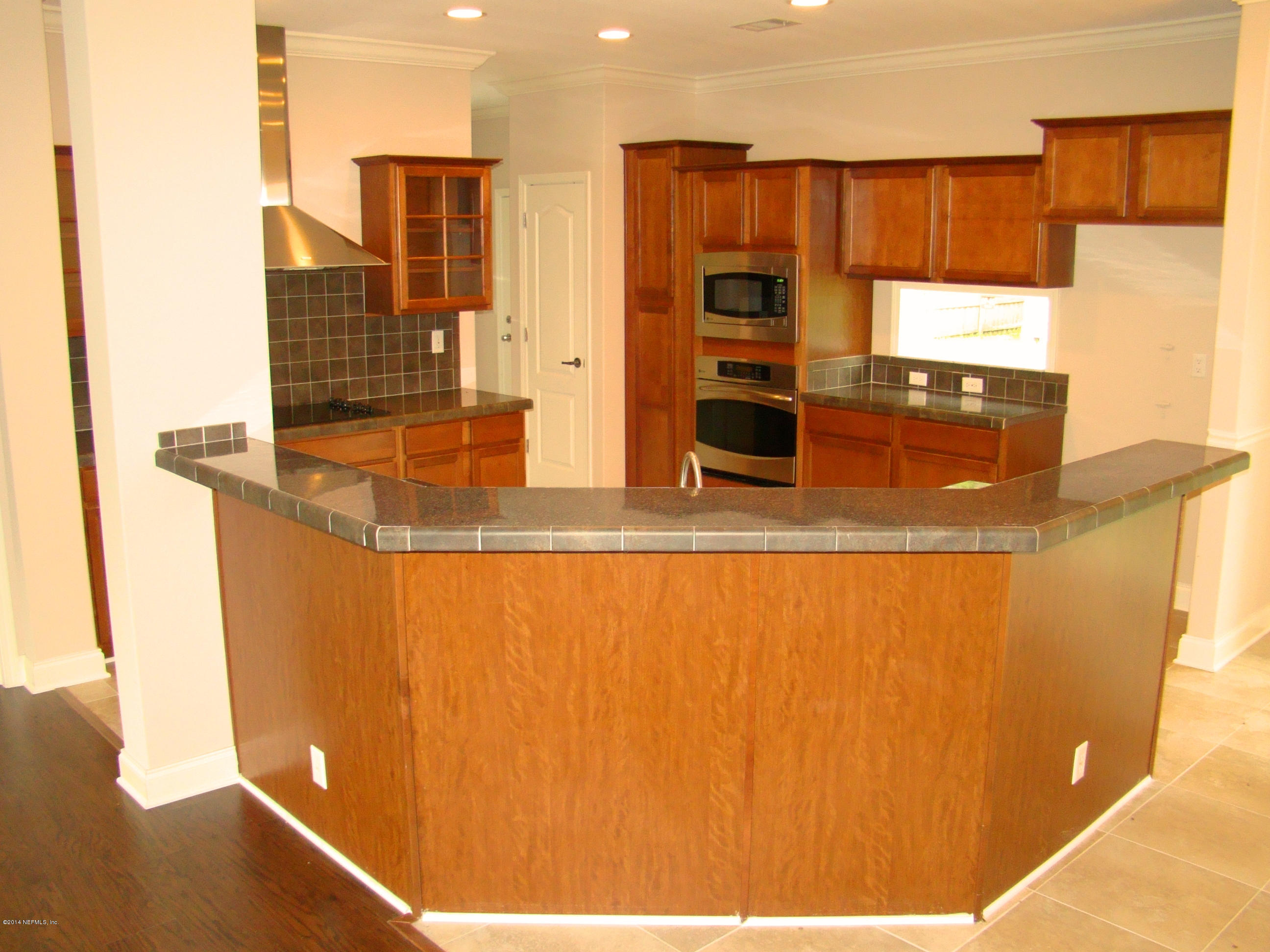 1716 Mccaul Road Jacksonville, FL 32220 - Photo 8 of 25 a view of a kitchen with a sink