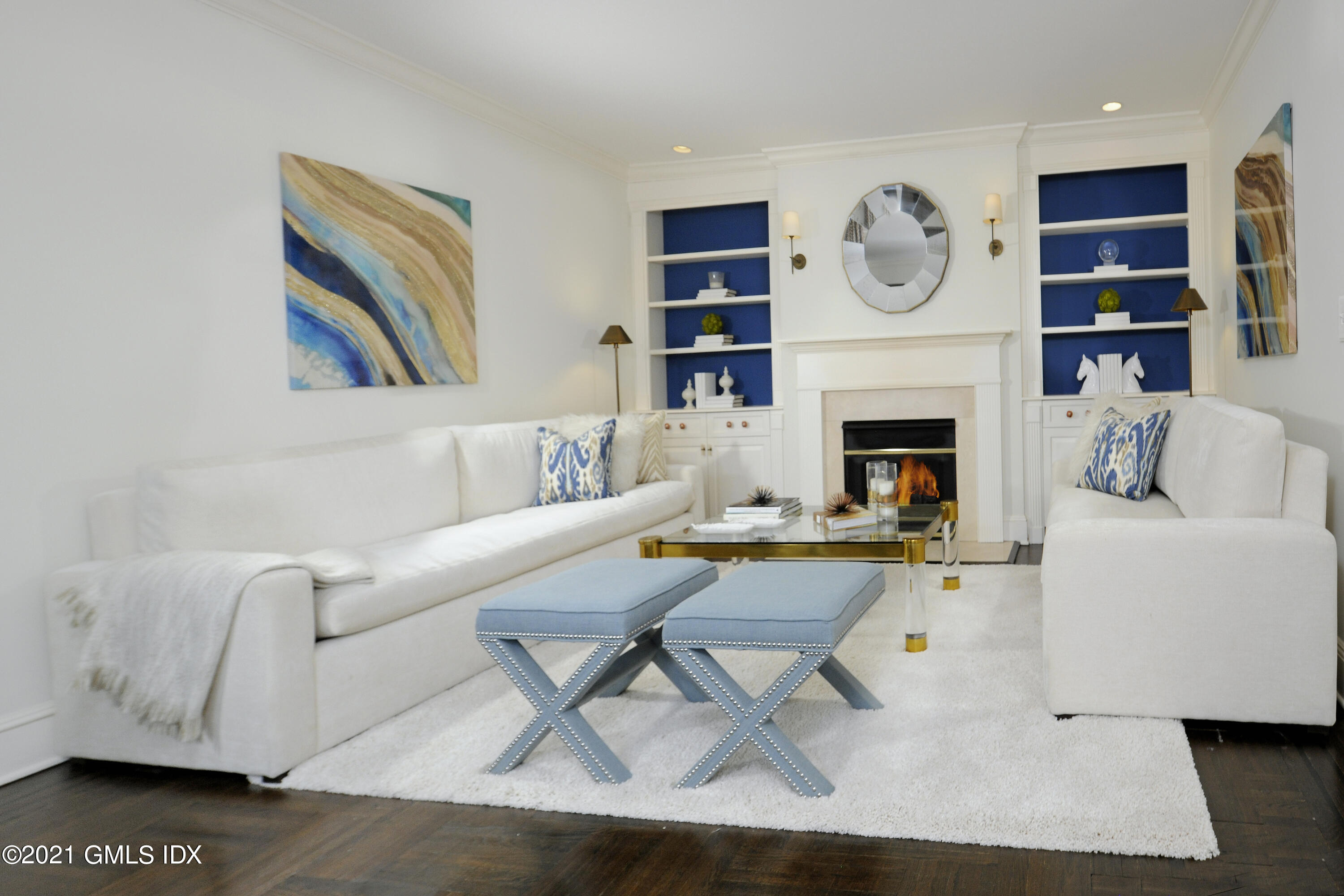 25 West Elm Street, Unit 47 Greenwich, CT 06830 - Photo 5 of 18 a living room with furniture and a fireplace