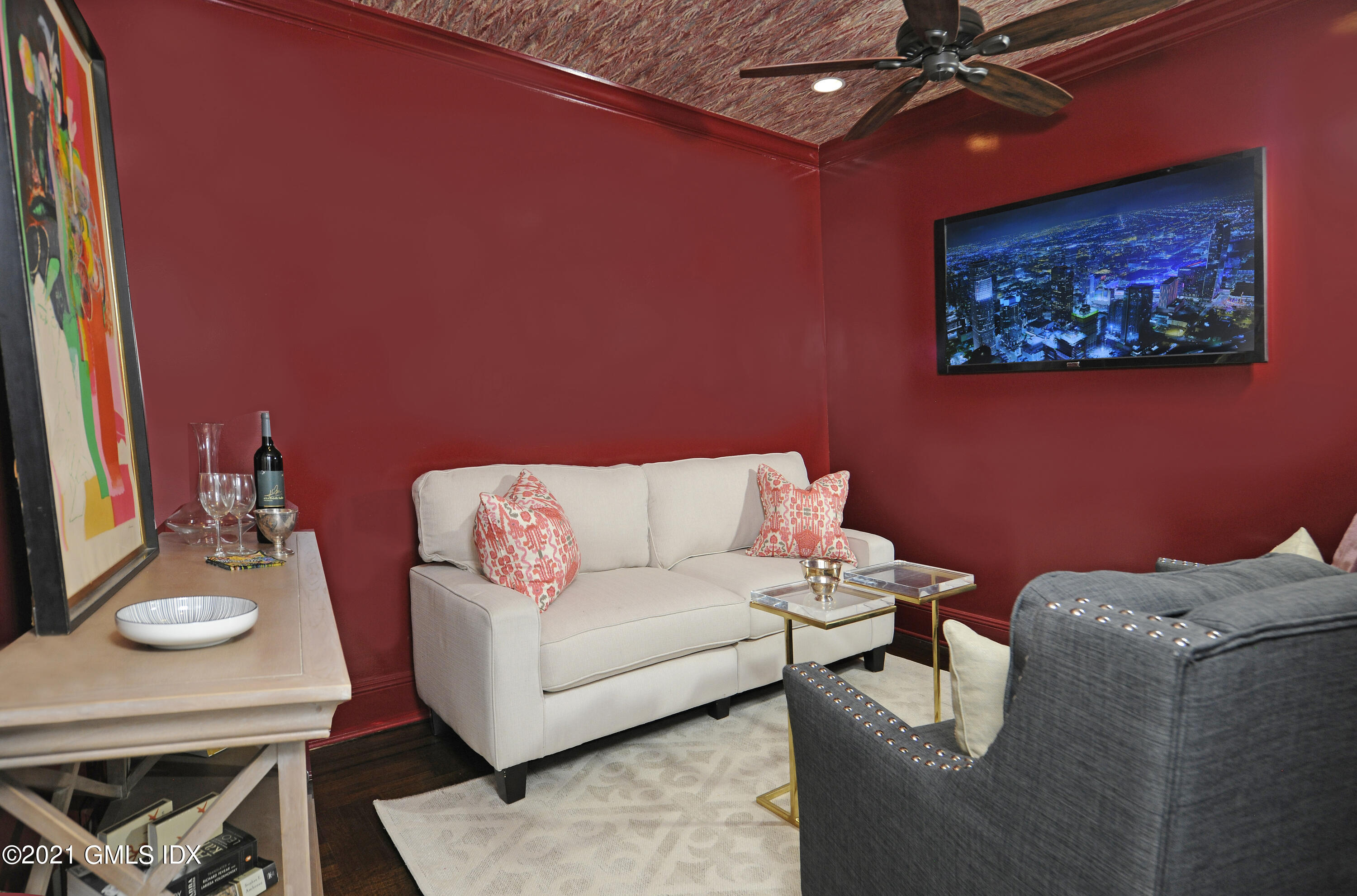 25 West Elm Street, Unit 47 Greenwich, CT 06830 - Photo 7 of 18 a living room with furniture and a flat screen tv