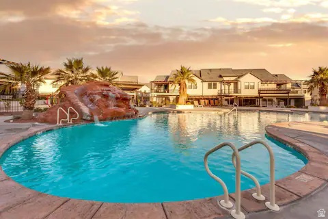 2600 Ocotillo Way, Unit 56 Santa Clara, UT 84765 - Photo 28 of 33 Community pool with a patio