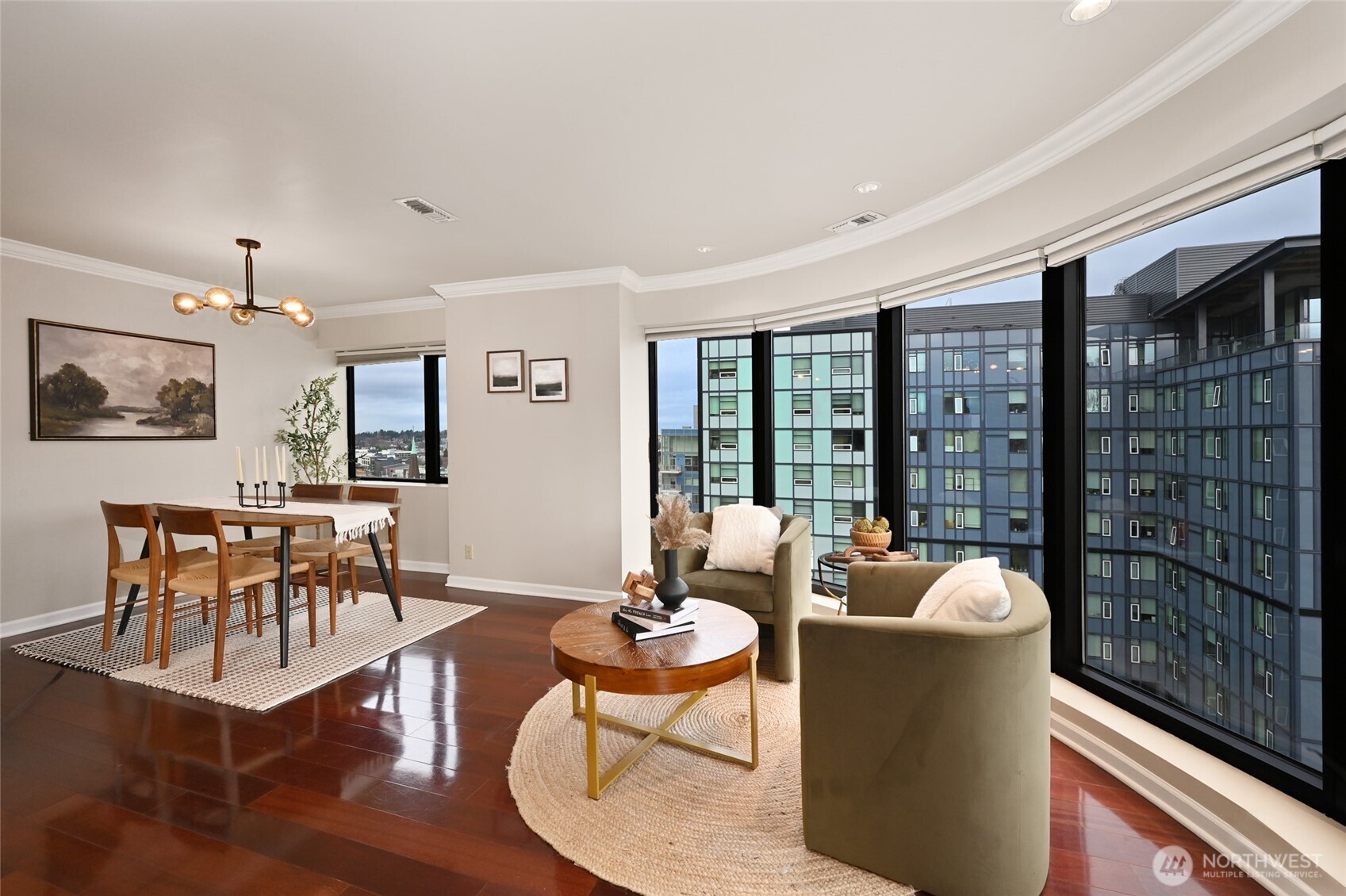 1301 Spring Street, Unit 16C Seattle, WA 98104 - Photo 5 of 33 a living room with furniture and a large window