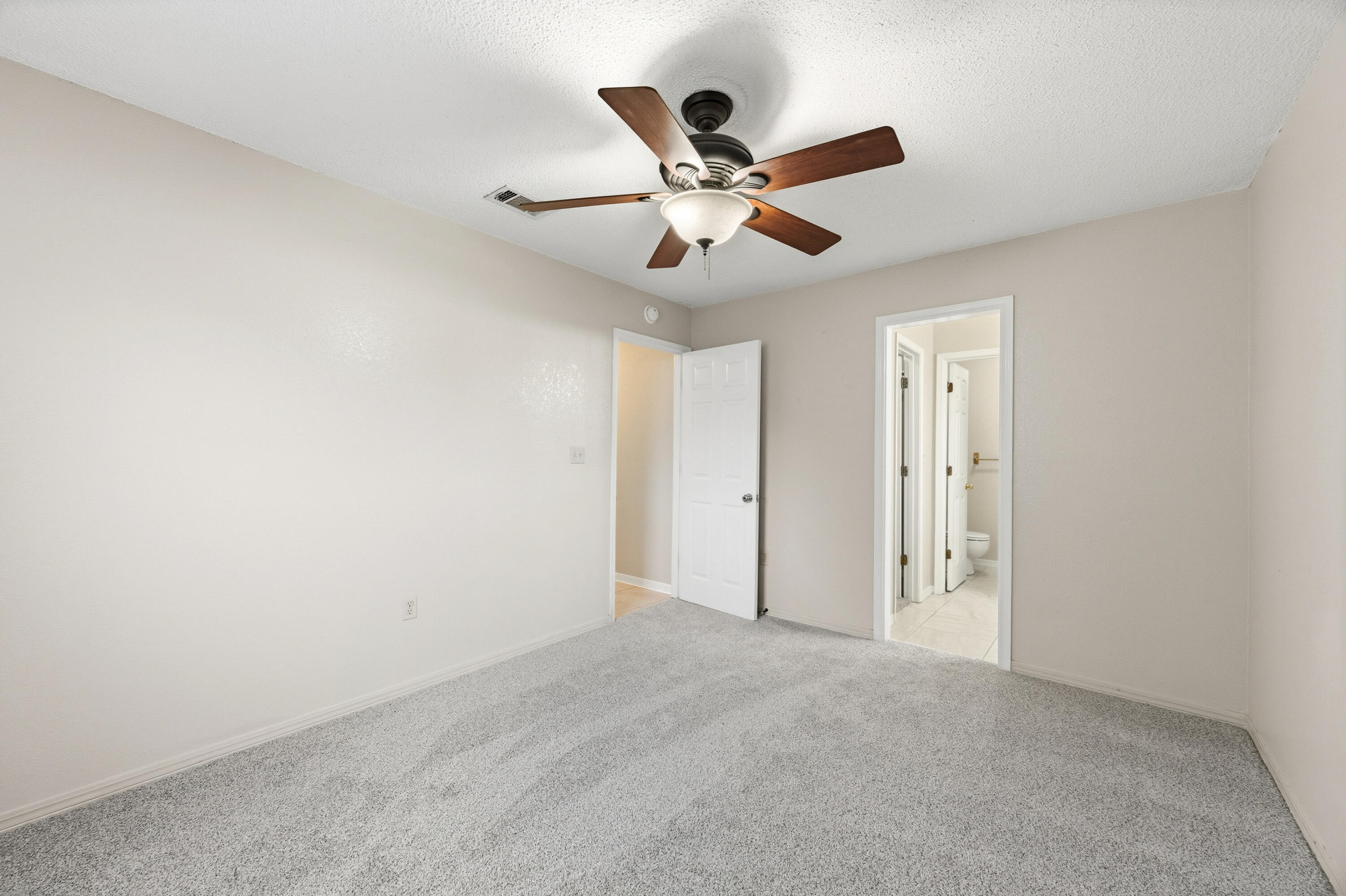 815 Valley Road Crestview, FL 32539 - Photo 19 of 40 a view of an empty room and window