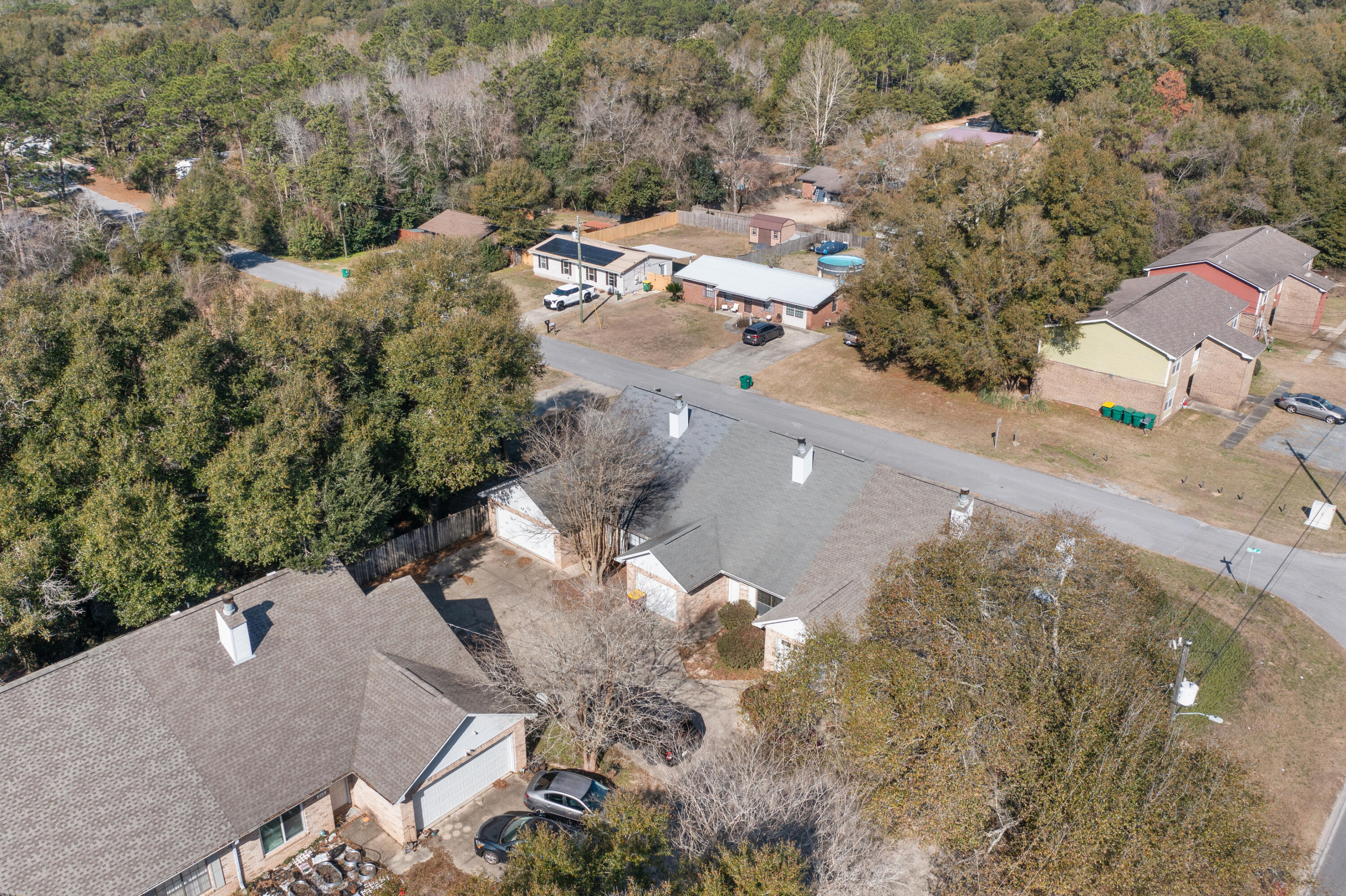 815 Valley Road Crestview, FL 32539 - Photo 36 of 40 an aerial view of a house with a yard and mountain view in back