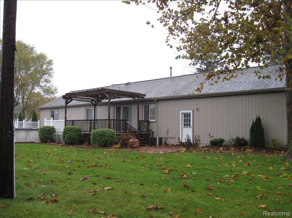 48770 Bemis Road Belleville, MI 48111 - Photo 17 of 20 Back of Home
