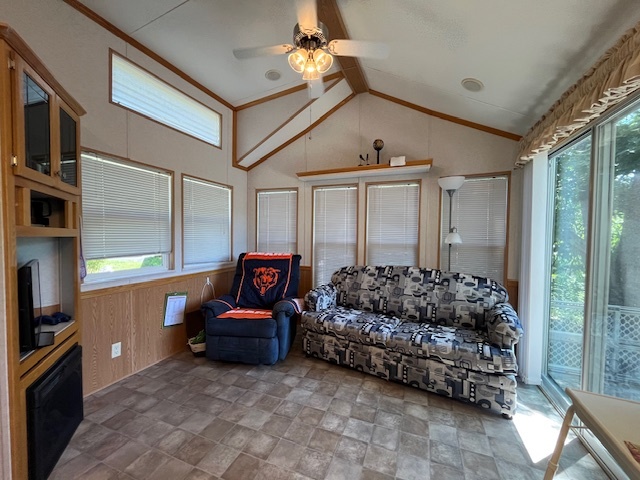 2795 East 28th Road Marseilles, IL 61341 - Photo 11 of 65 a living room with furniture gym equipment and a chandelier