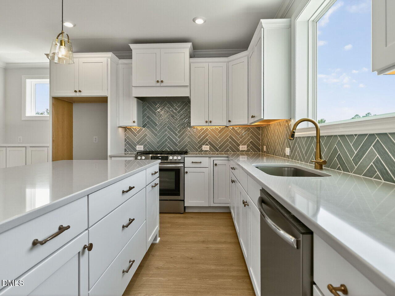 1209 Barreto Drive Wendell, NC 27591 - Photo 14 of 47 a kitchen with granite countertop a sink and cabinets