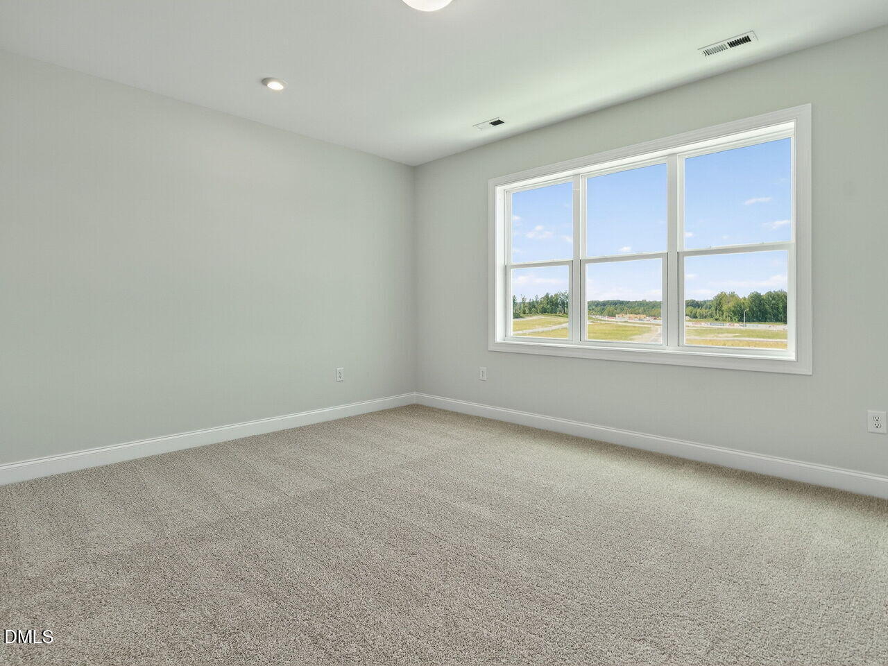 1209 Barreto Drive Wendell, NC 27591 - Photo 20 of 47 an empty room with a window