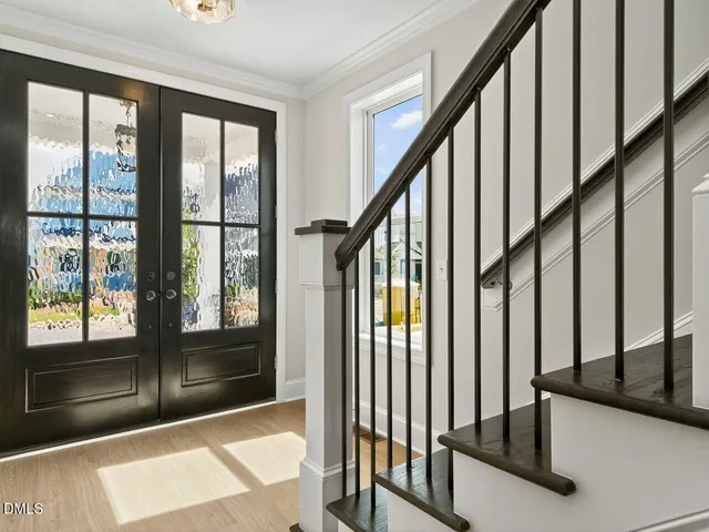 a view of a kitchen with a sink and a window