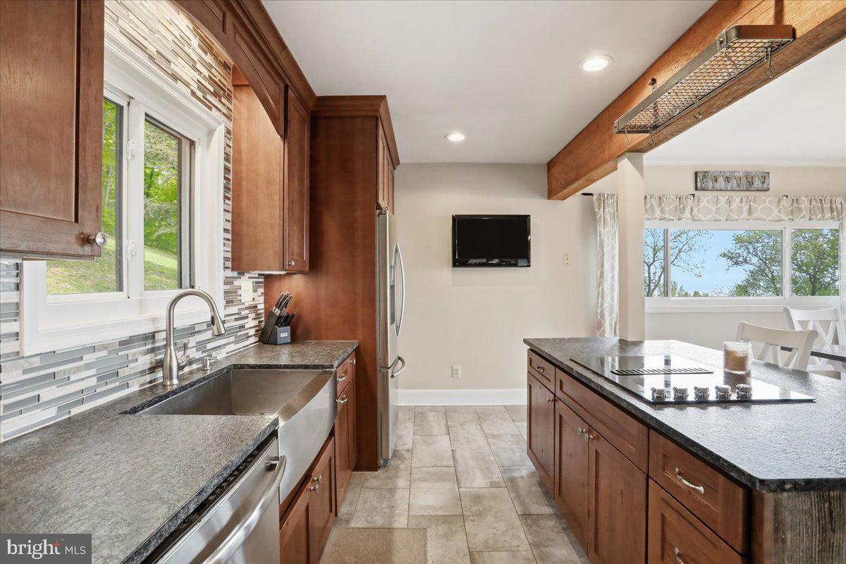 19897 Foresthill Road Bluemont, VA 20135 - Photo 18 of 39 a kitchen with a sink stove and microwave