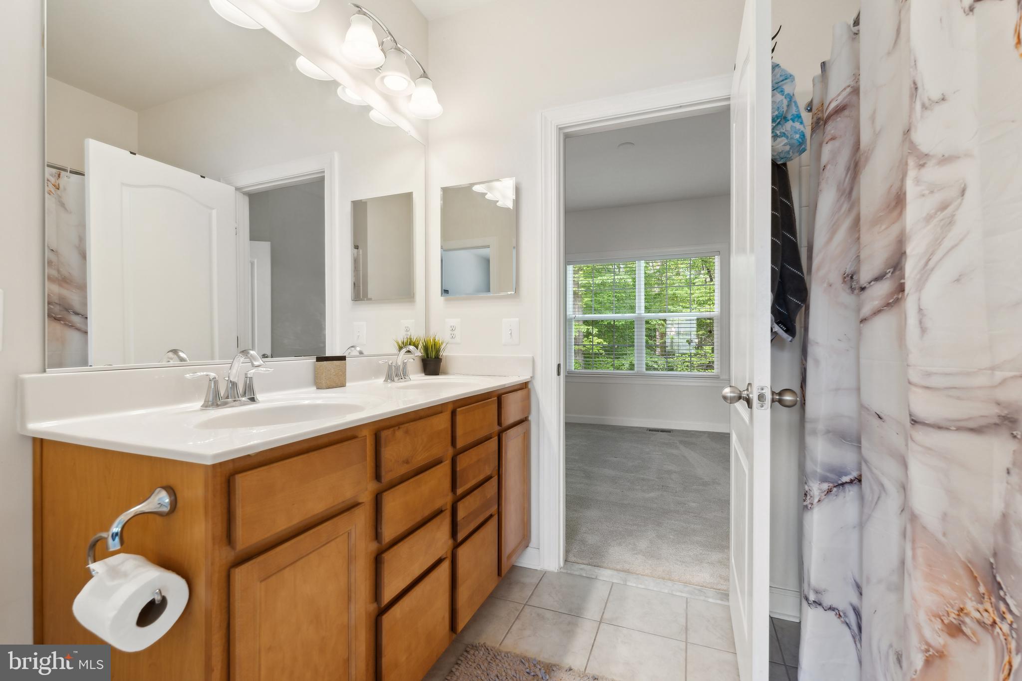683 Loch Haven Road Edgewater, MD 21037 - Photo 33 of 52 Jack and Jill bathroom between 2nd and 3rd bdrms